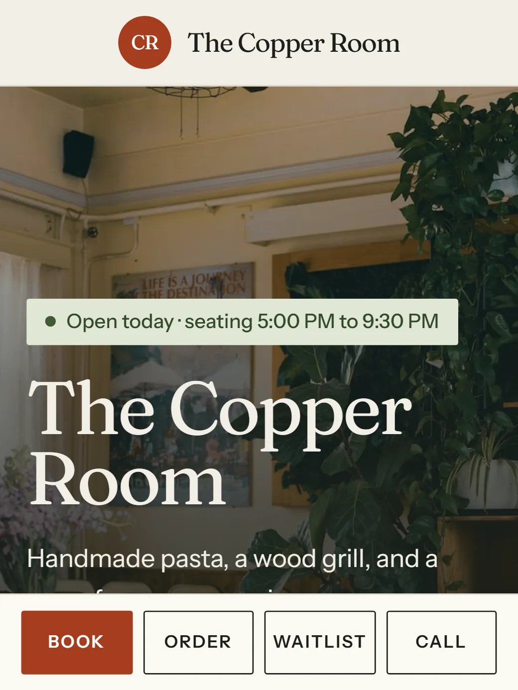 The same website in the lighter Market look, with a dining-room photo behind the name